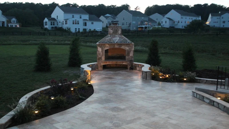Luxury flagstone patio design with fire pit in Northern VA