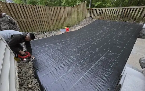 2.7oz woven polypropylene weed barrier installation